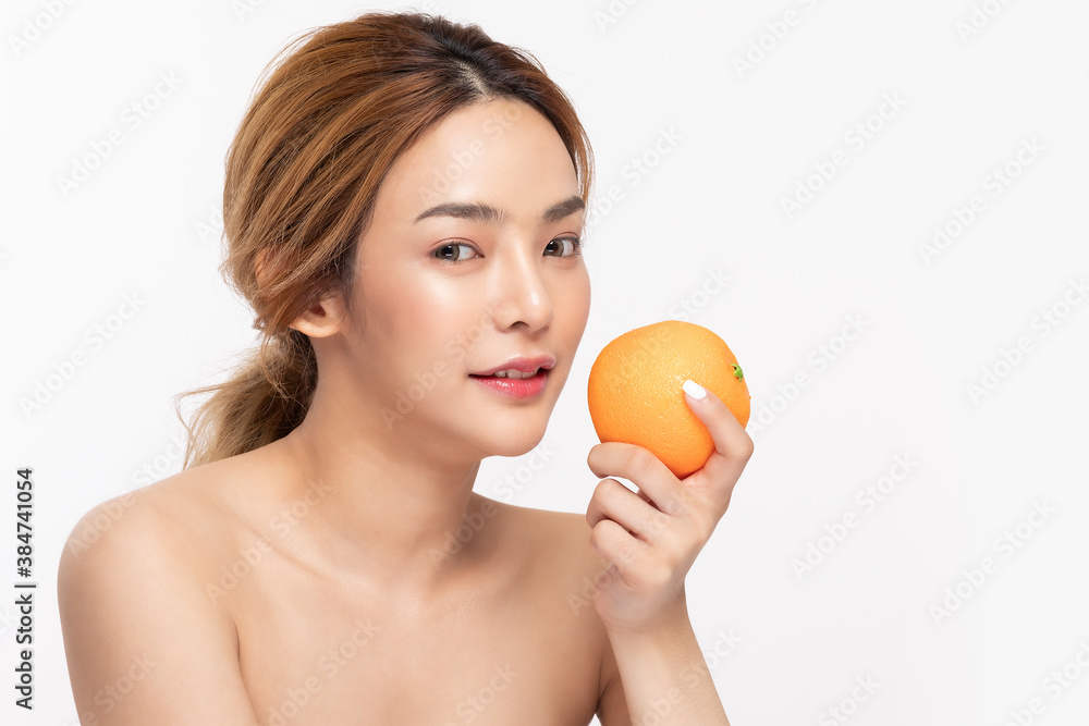 Beautiful Young Asian Woman Holding orange vitamin c smile feeling so happy and cheerful with healthy Clean and Fresh skin,isolated on white background,Beauty Cosmetics spa and treatment Concept Beautiful Young Asian Woman Holding orange vitamin c smile feeling so happy and cheerful with healthy Clean and Fresh skin,isolated on white background,Beauty Cosmetics spa and treatment Concept