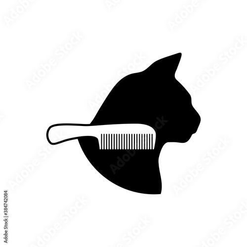 Salón de belleza para mascotas. Logotipo cabeza de gato con cepillo del pelo en color negro