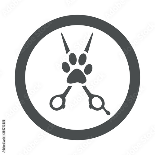 Peluquería de mascotas. Logotipo con tijera de peluquero y zarpa de perro en círculo color gris