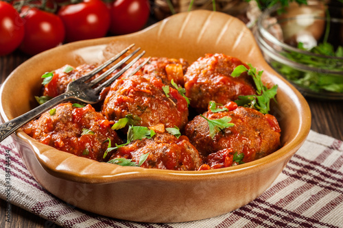 Pork meatballs with spicy tomato sauce in dish