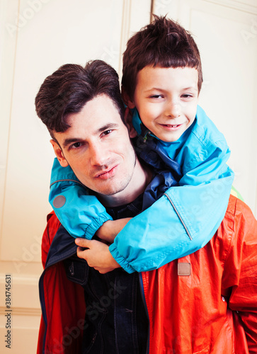 faher and son together having fun at home, lifestyle happy family, people at home photo