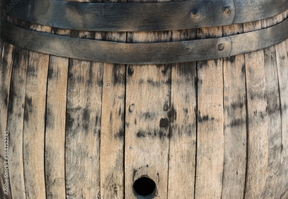 Fragment of an old wooden barrel. Great as a background image Fragment of an old wooden barrel. Great as a background image