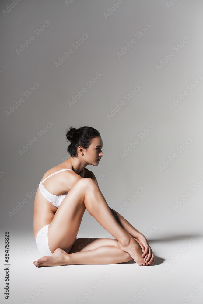 calm healthy woman sitting on the floor calm healthy woman sitting on the floor