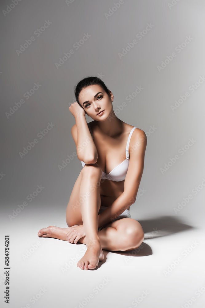 sporty woman having a rest on the floor sporty woman having a rest on the floor