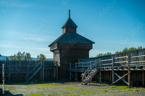 Natural landscape with wooden buildings. photo