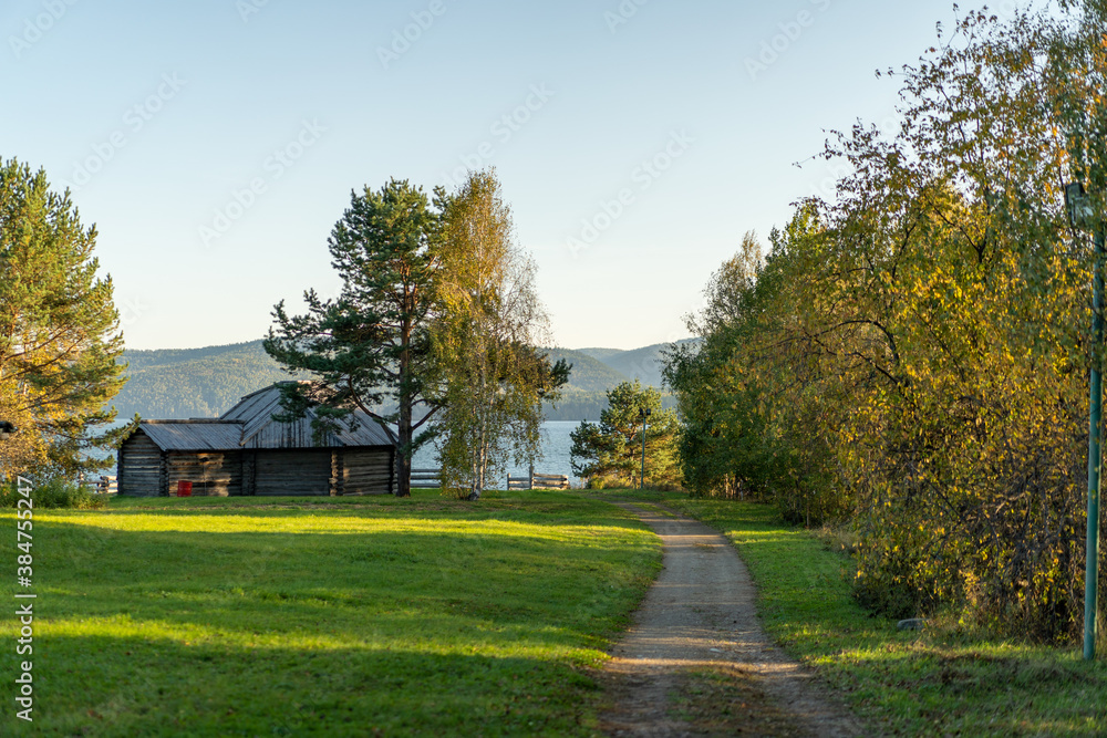 Fototapeta premium Natural landscape with wooden buildings.