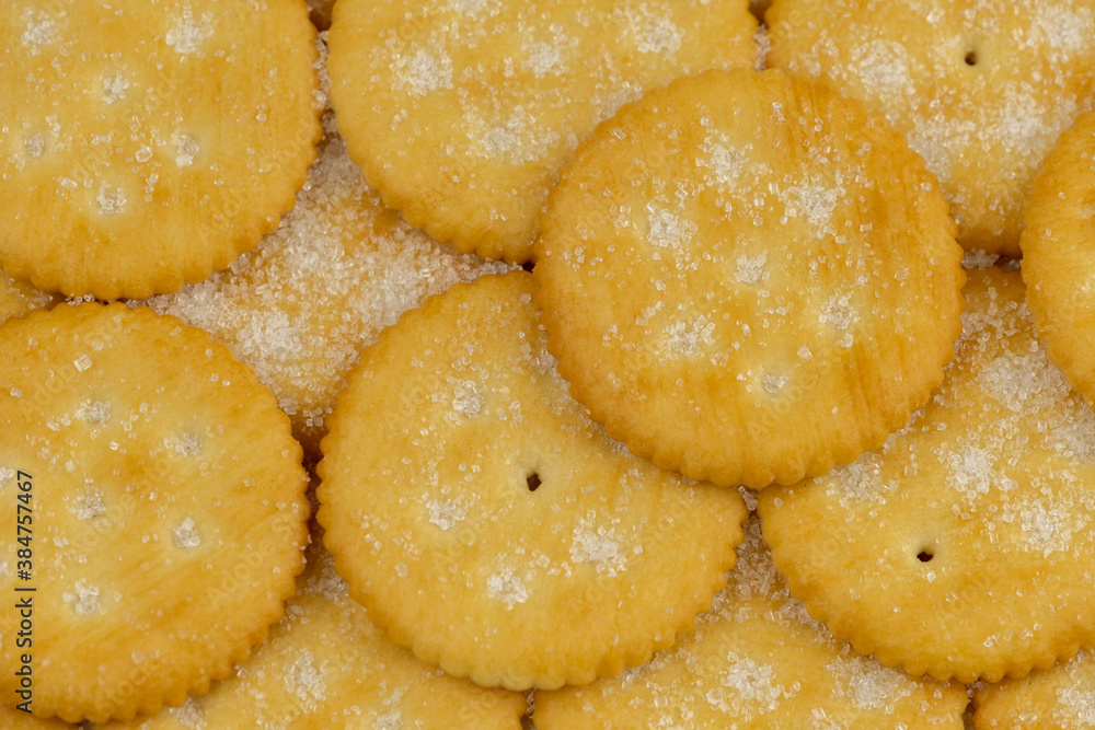 Pile of round cracker with sweet sugar on top pattern