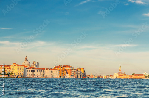 Tela Venice cityscape with water of Giudecca canal of Venetian lagoon, embankment of
