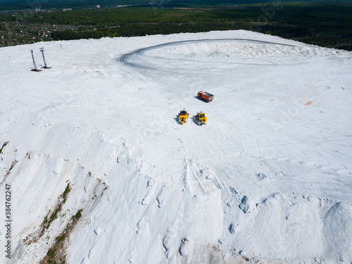 View from drone of unusual White Mountain in Podmoskovye, Russia - large open air slagheap of Lopatinsky phosphate mine