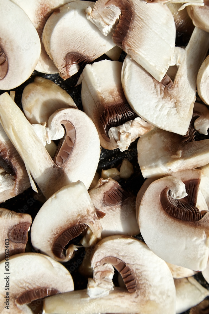 Food background - fresh sliced white champignons Food background - fresh sliced white champignons