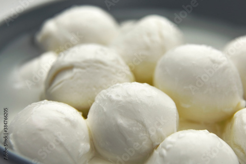 Mozzarella balls with liquid. Traditional italian cheese.