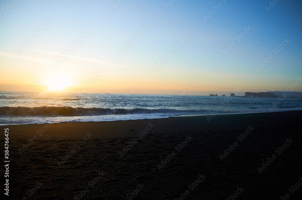 
black beach sunset romance