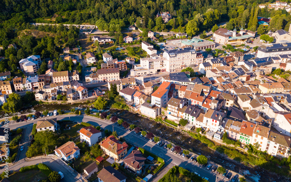 Aerial view of Ax-les-Thermes with buildings and The Lauze river in France, Midi-Pyrenees