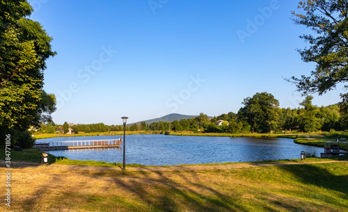 Ciekoty lake and park surrounding Zeromszczyzna - historic museum manor house of Stefan Zeromski, polish literate and poet in Ciekoty, Poland photo