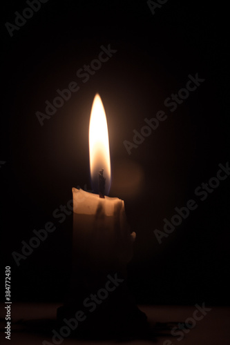 candle in the dark background