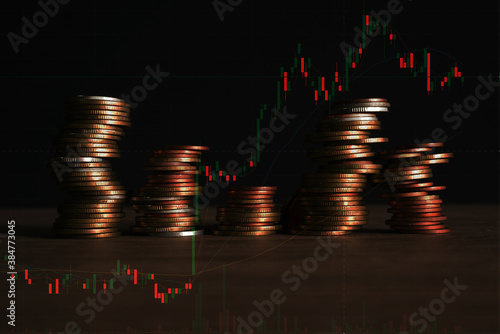 graph coins stock finance and business concept