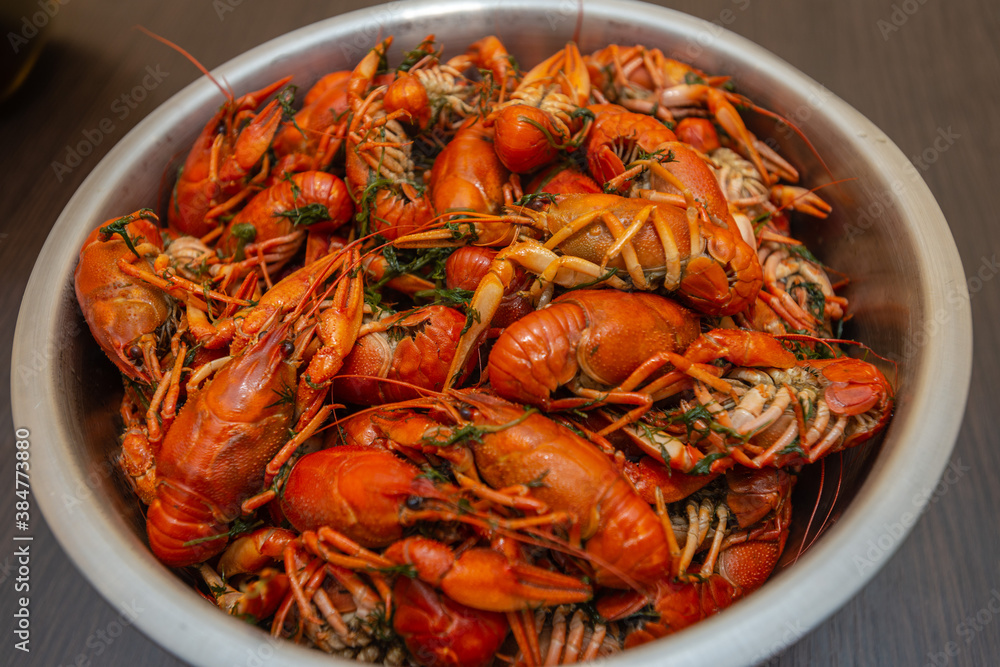 Large bowl of fresh boiled crawfish with dill from above Large bowl of fresh boiled crawfish with dill from above