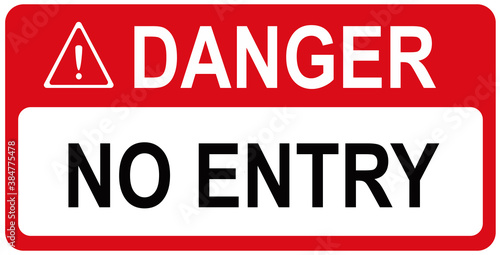 A sign that says   DANGER NO ENTRY.  WARNING. NO TRESPASSING.