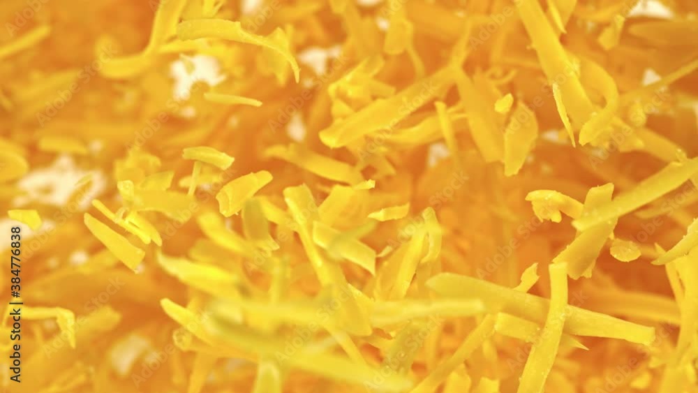 Super Slow Motion Shot of Flying Grated Cheese at 1000 fps. Super Slow Motion Shot of Flying Grated Cheese at 1000 fps.
