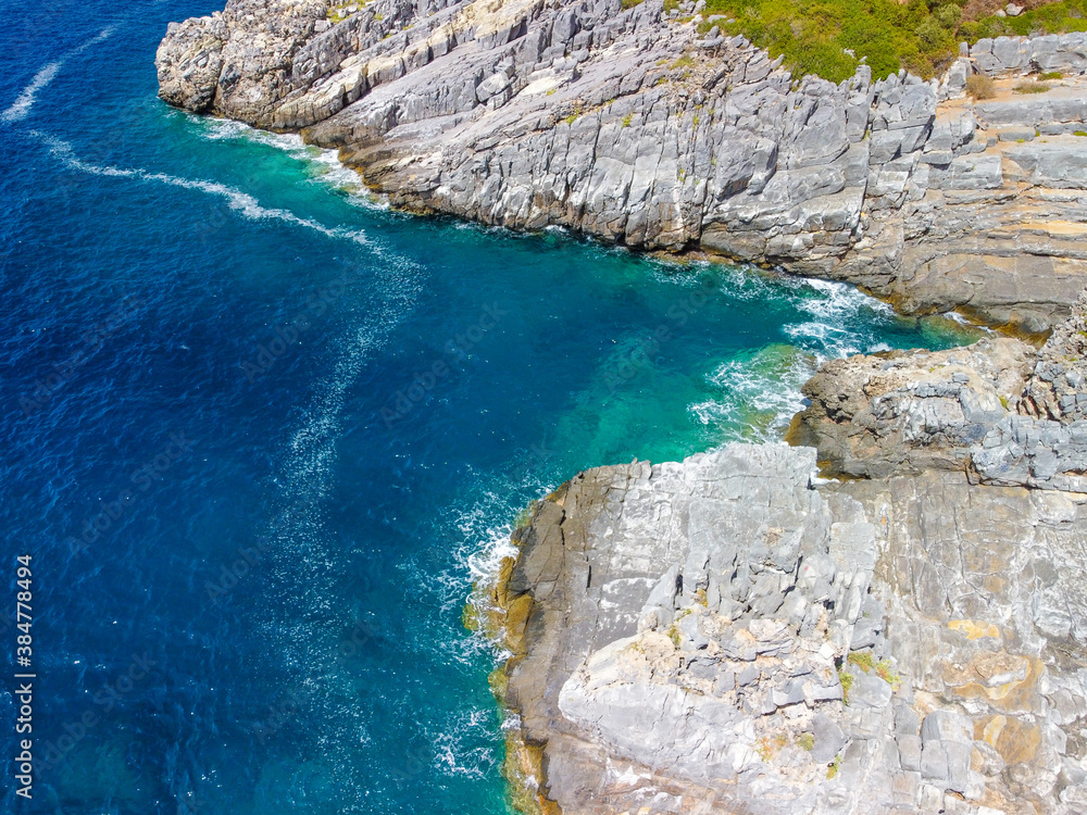 Aerial view of Katafygi rocky plateau beach in Mani, Greece