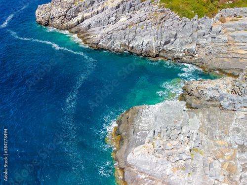 Aerial view of Katafygi rocky plateau beach in Mani, Greece