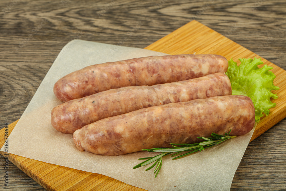 Raw pork meat sausages for grill Raw pork meat sausages for grill