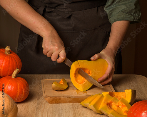 slicing pumpkin, cooking pumpkin, working in the kitchen