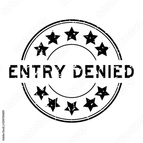 Grunge black entry denied word with star icon round rubber seal stamp on white background