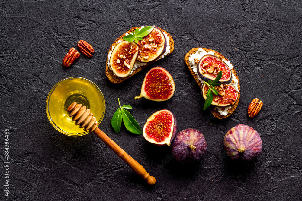Figs with cream cheese and honey sandwich. Top view Figs with cream cheese and honey sandwich. Top view