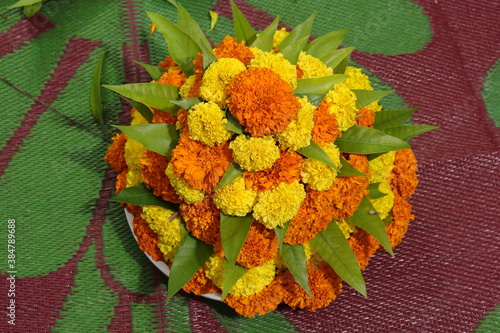 colorful flowers stacked up to create bathukamma, a specific hindu god worshiped in south india photo