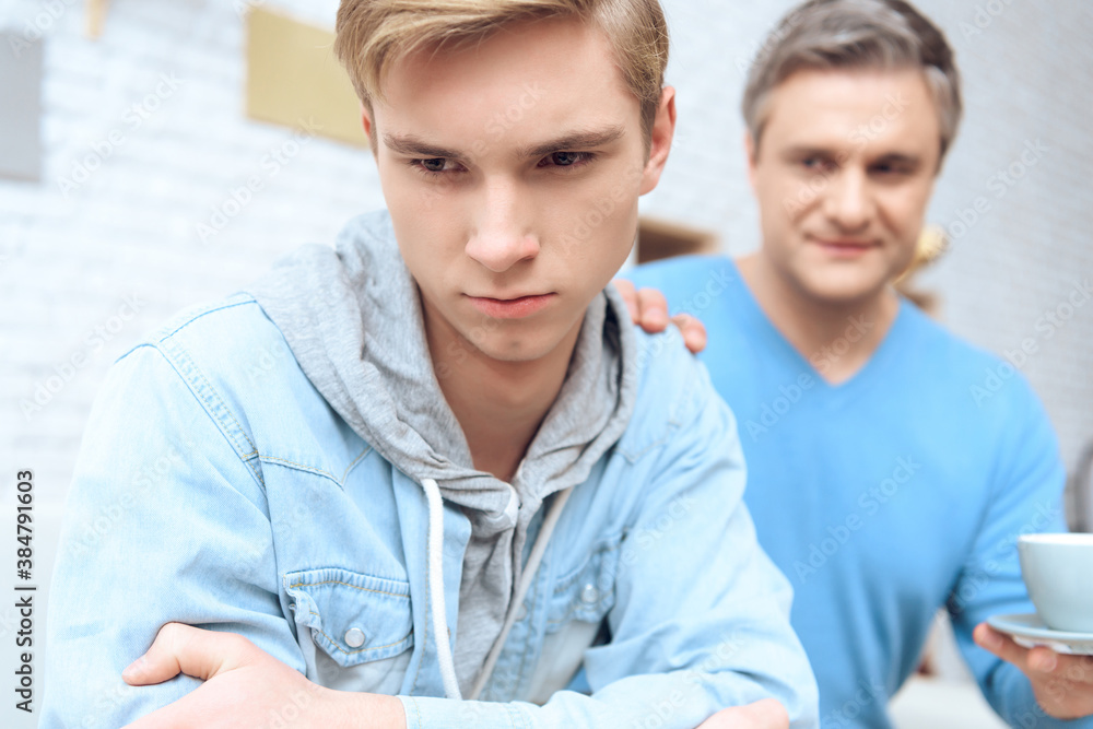 Dad brought his son coffee, for offended son. Dad brought his son coffee, for offended son.