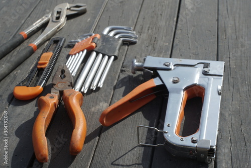 Different Reparement Tools On Black Table 