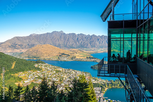 Queenstown, New Zealand - Feb 7, 2020: The tourists are enjoying their meal at Stratosfare Restaurant & Bar on the top of Skyline Gondola.