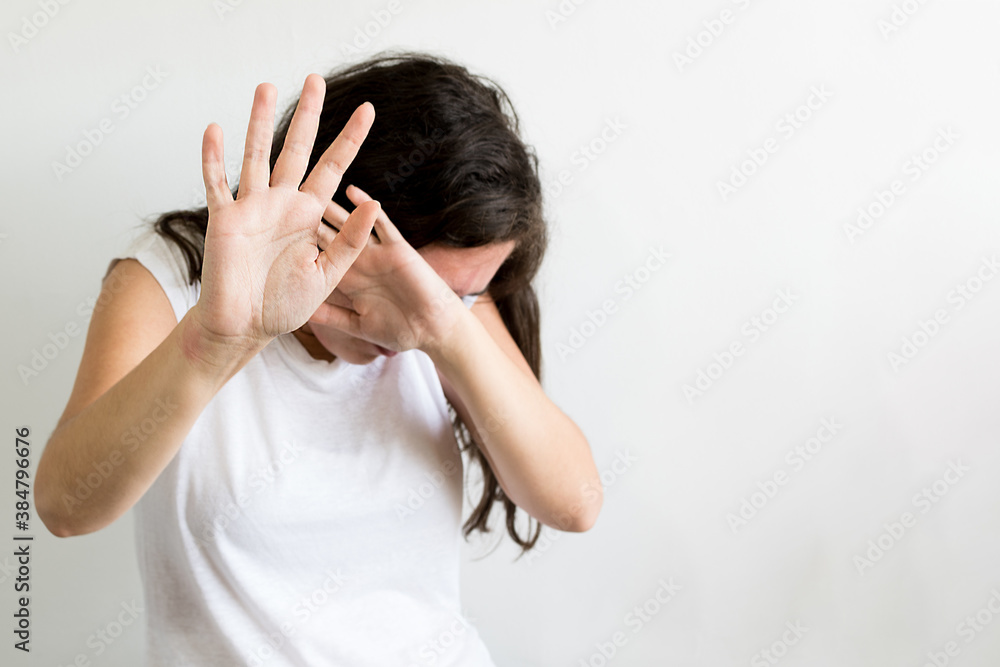 woman raised her hand for dissuade, campaign stop violence against women. International Women's Day woman raised her hand for dissuade, campaign stop violence against women. International Women's Day