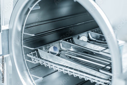 Canvas Print Sterilizing medical instruments in autoclave. Dental office