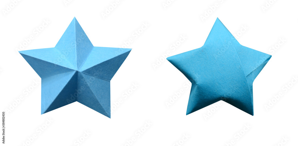 A blue origami star on wooden A blue origami star on wooden