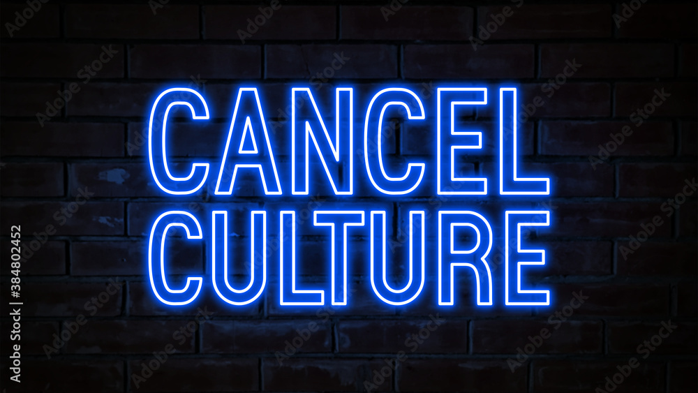 Cancel culture - blue neon light word on brick wall background Cancel culture - blue neon light word on brick wall background