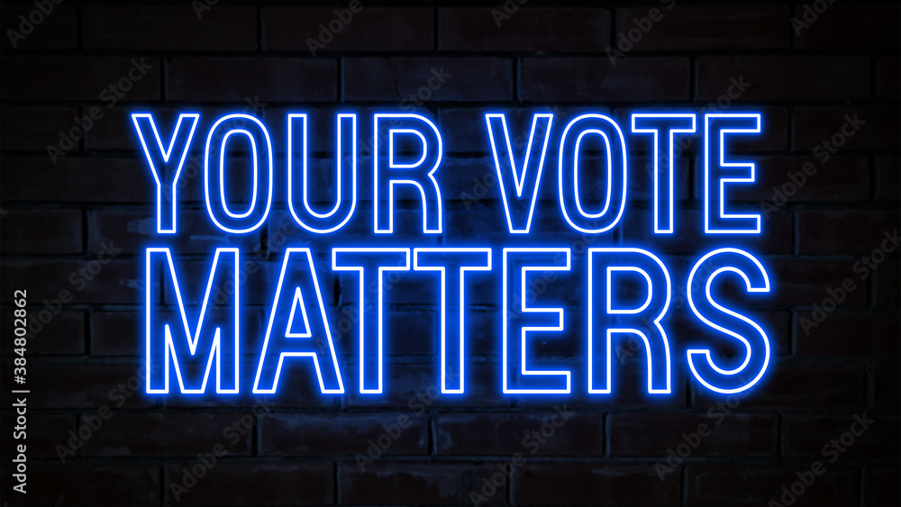 Your vote matters - blue neon light word on brick wall background