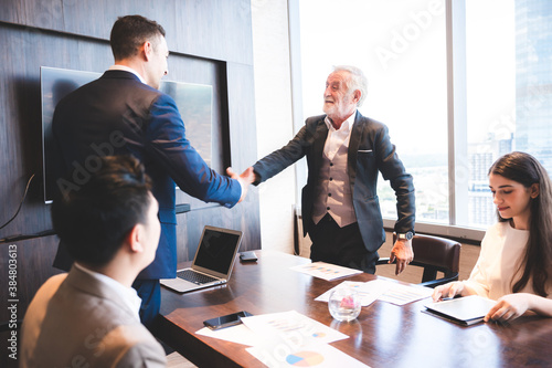 business people hands shake...