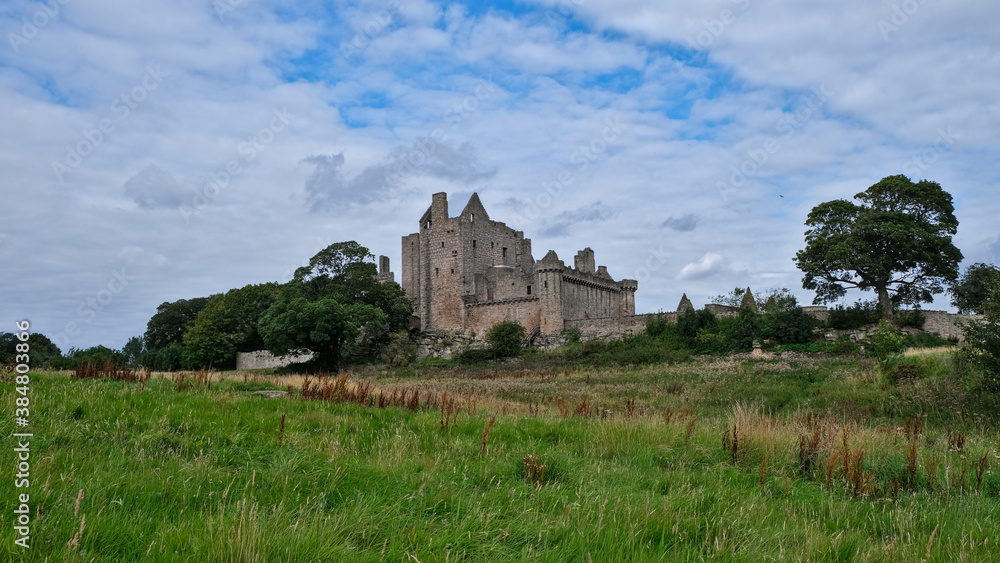 Summer photo of the famous Craigmillar Castle and gardens, home of Mary Queen of Scots in Edinburgh Scotland UK Summer photo of the famous Craigmillar Castle and gardens, home of Mary Queen of Scots in Edinburgh Scotland UK