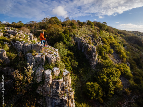 Photographer taking shots of Cheddar Gorge in England photo