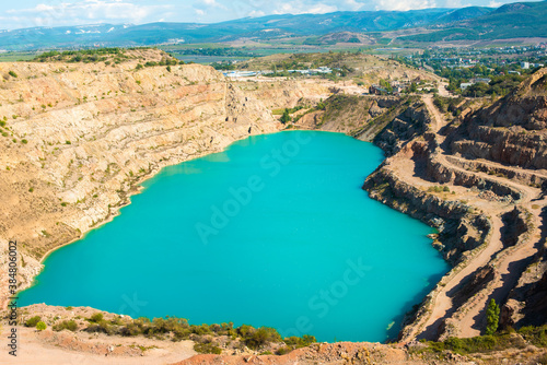Russia, Crimea. turquoise heart-shaped lake. Kadykovsky quarry. tourism in summer. beach vacation, hiking, mountains
