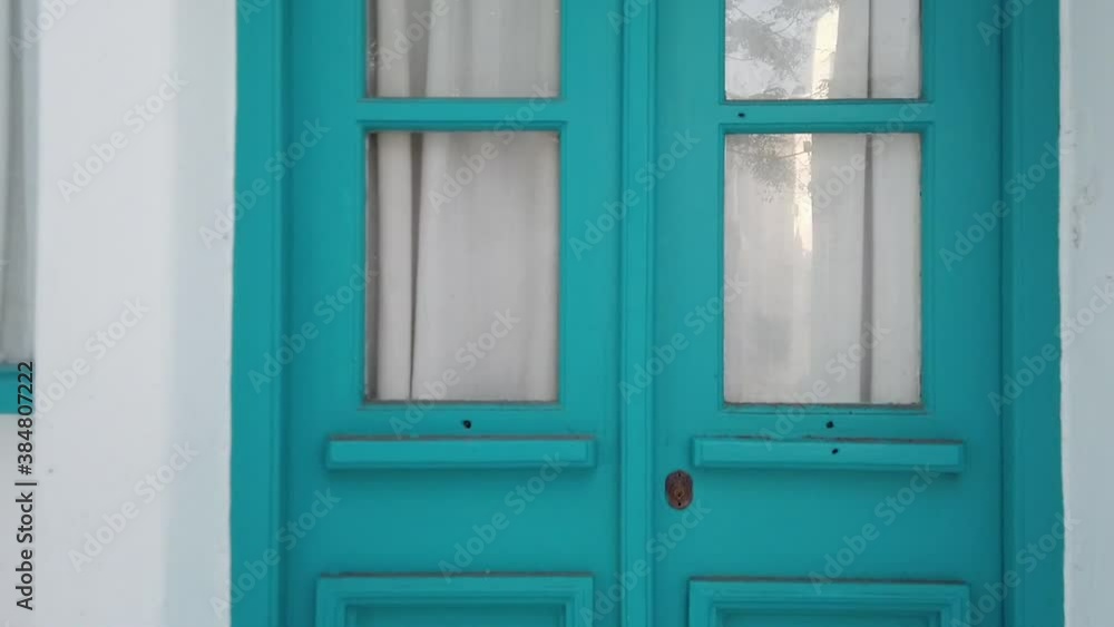 Walking Towards Blue Door In Mykonos