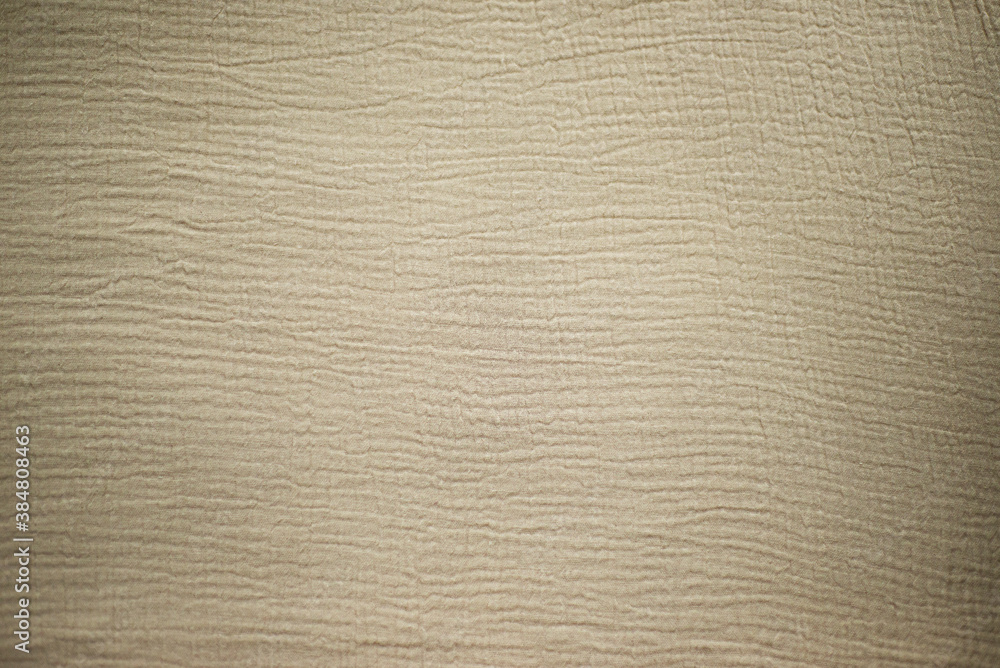 Fabric texture. Beige multi-layered muslin background for different designs. Textile theme. Fabric texture. Beige multi-layered muslin background for different designs. Textile theme.