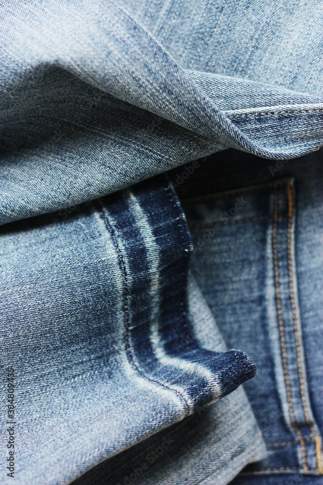 Fototapeta premium Beautiful blue jeans background close up view