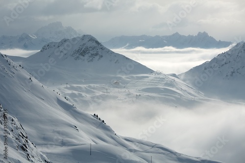 Skiing slopes in the French Alpes above the clouds, Paradiski, Les Arcs
