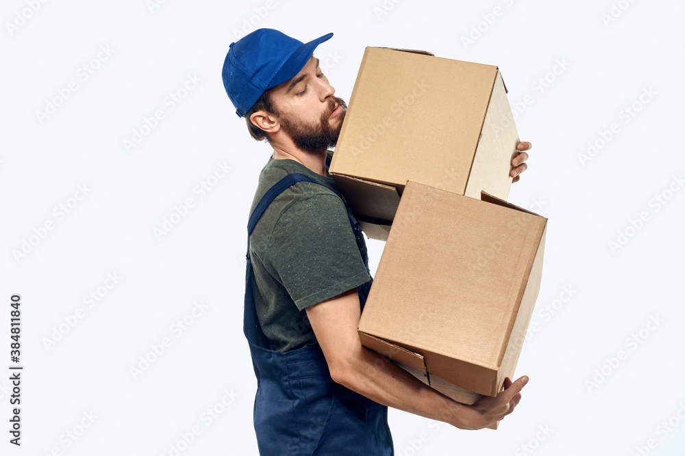 Working man with boxes in hands delivery service work lifestyle Working man with boxes in hands delivery service work lifestyle