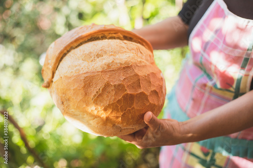 Fényképezés Trabzon Bread, Bakery Products, Pastry and Bakery woman's hand holding trabzon b