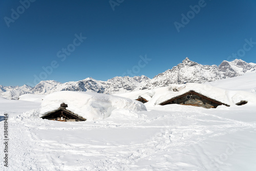 Valmalenco, Lombardy Alps, Italy: Mountain huts submerged by snow