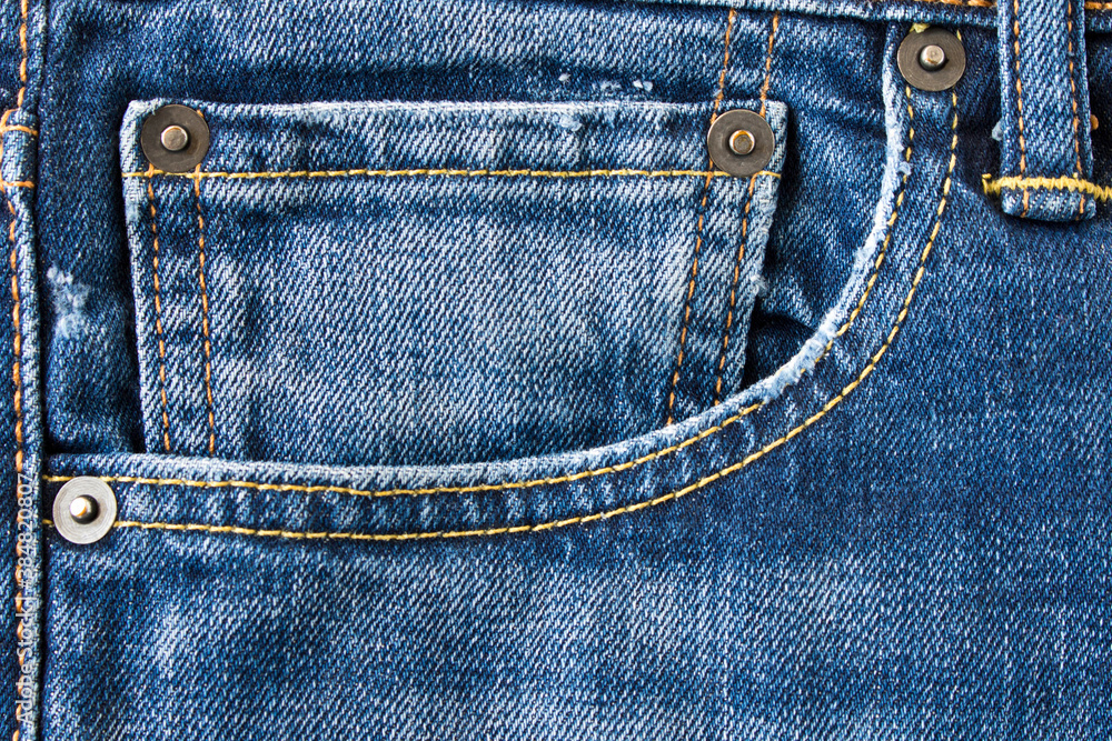 Denim texture. Seam on jeans. Close up. Selective focus. Denim texture. Seam on jeans. Close up. Selective focus.